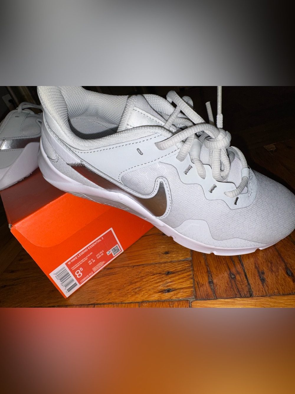 Nike Women's LEGEND ESSENTIAL 2 'PHOTON DUST METALLIC SILVER' - Picture 5 of 9